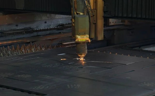 Steel plate cut into machine components