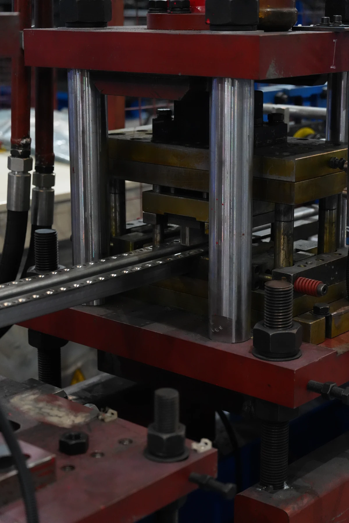 Site-visit view of a press station and perforated steel profile