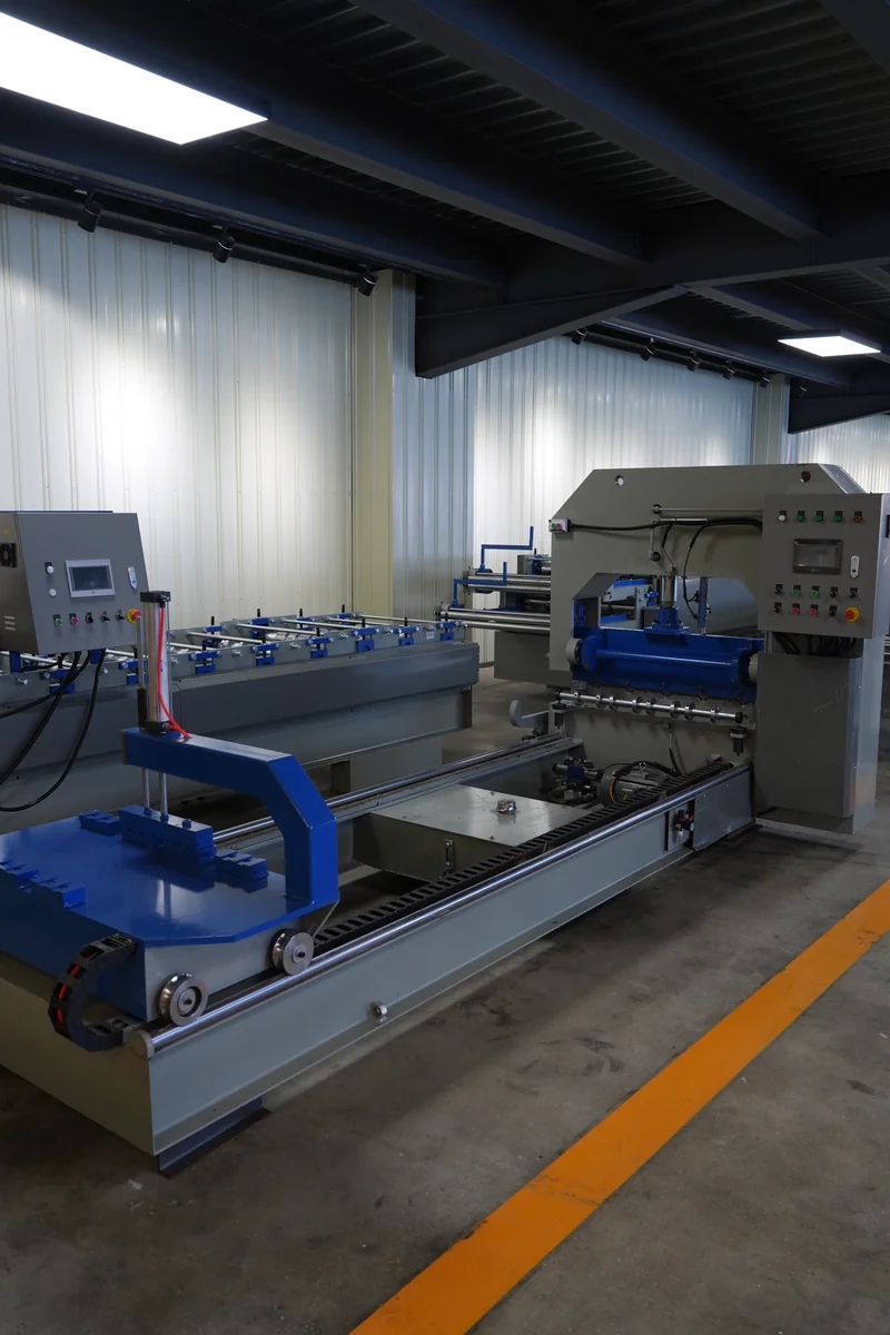 Downstream handling station with rollers photographed during a Xiamen factory visit